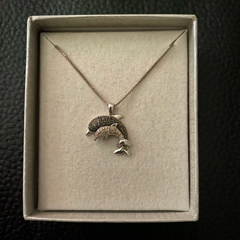 Black and white Zales dolphin necklace